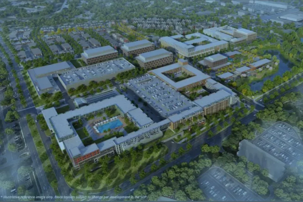 Aerial view of a large area of development in what was once a shopping mall.