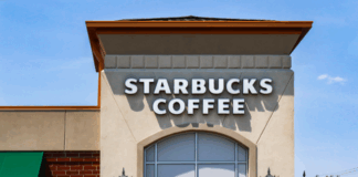 Photo of the exterior of a Starbucks Coffee building.