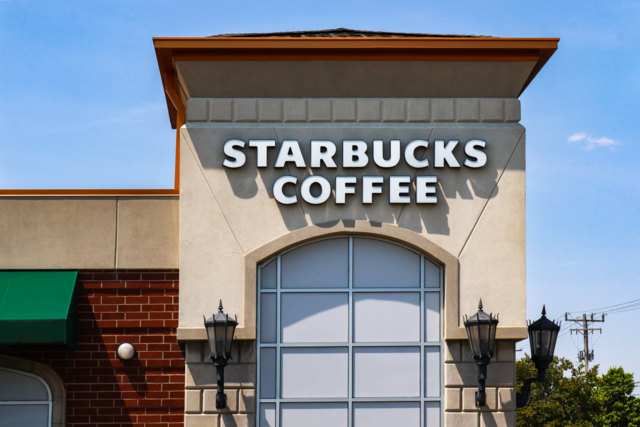 Photo of the exterior of a Starbucks Coffee building.