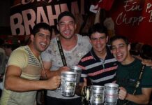 Fall Festivals and More This Weekend: Oct. 11 and 12 Stock photo of four young middle-aged men holding steins of beer and smiling.