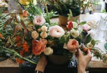 A person arranging flowers