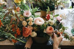 A person arranging flowers