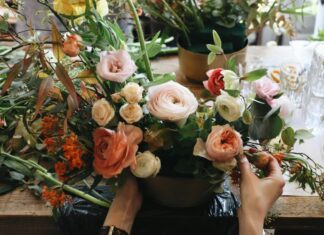 A person arranging flowers
