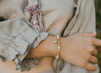 Woman wearing a charm bracelet