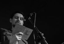 Things to Do This Weekend in Montgomery County (July 10-12) Man reading poetry from a book at an open mic