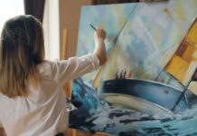 Things to Do This Weekend in Montgomery County (July 17-19) An artist painting a boat on the water