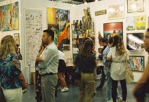 Things to Do This Weekend in Montgomery County (Sept. 4-7) People looking at paintings in an art gallery