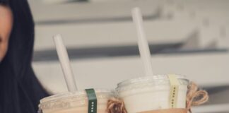 Two people toasting with bubble tea