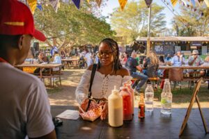 A woman buying food at a food festival