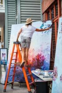 Person working on art outdoors