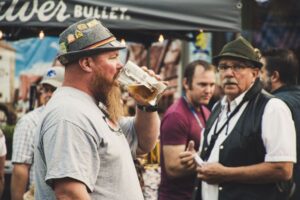 People drinking beer at an Oktoberfest celebration