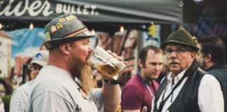 People drinking beer at an Oktoberfest celebration